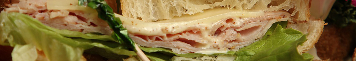 Eating Deli Sandwich at The Country Store restaurant in Westport, CT.
